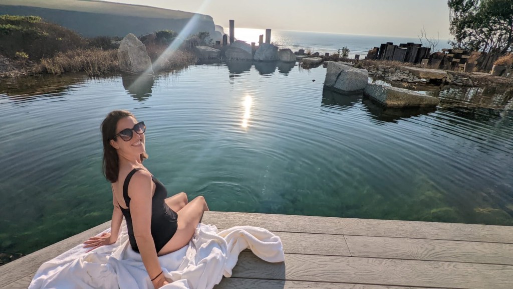Sitting beside the outdoor pool at Scarlet Hotel spa Watergate Bay